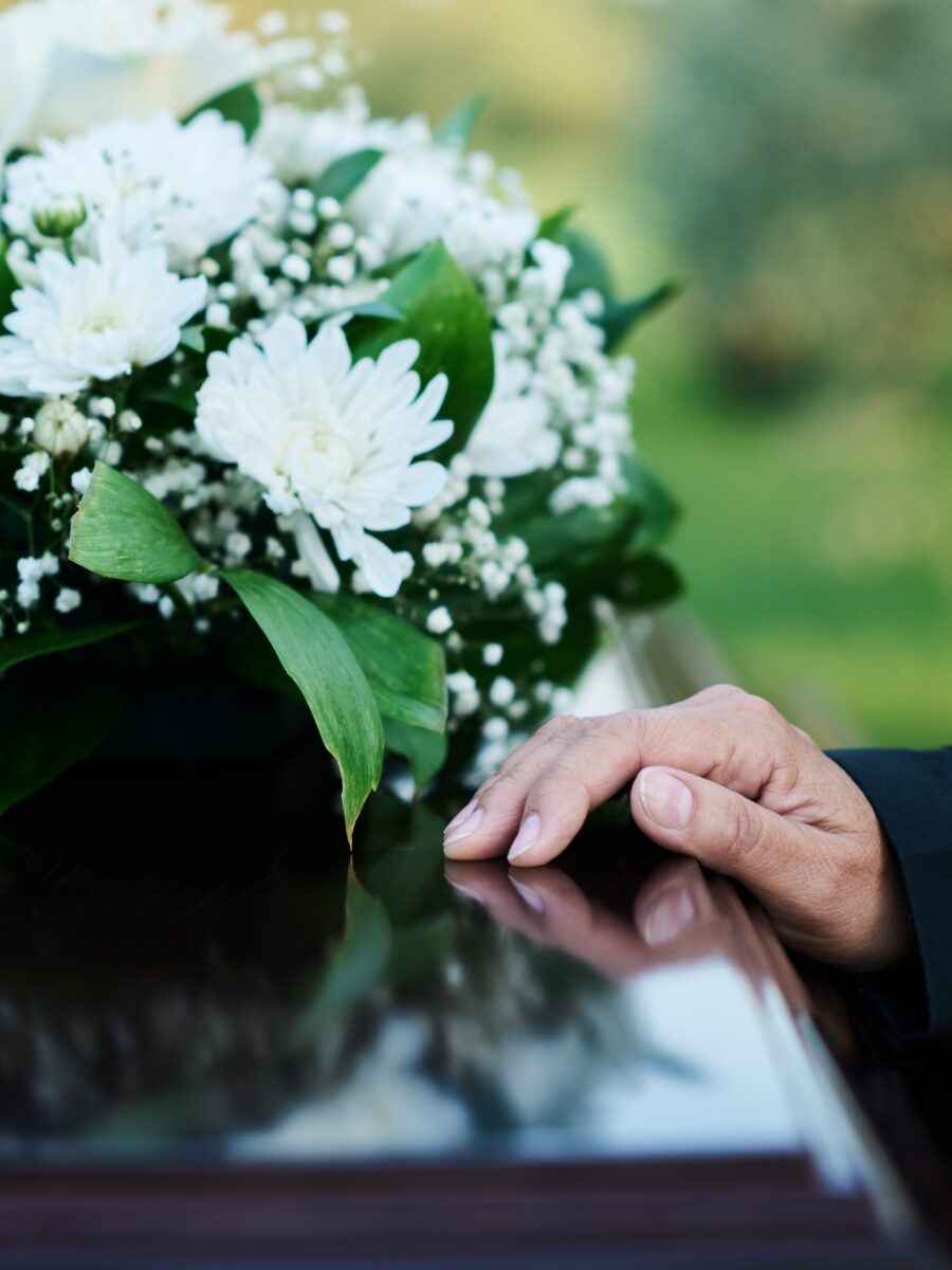 Focus,On,Hand,Of,Mourning,Mature,Woman,In,Black,Attire